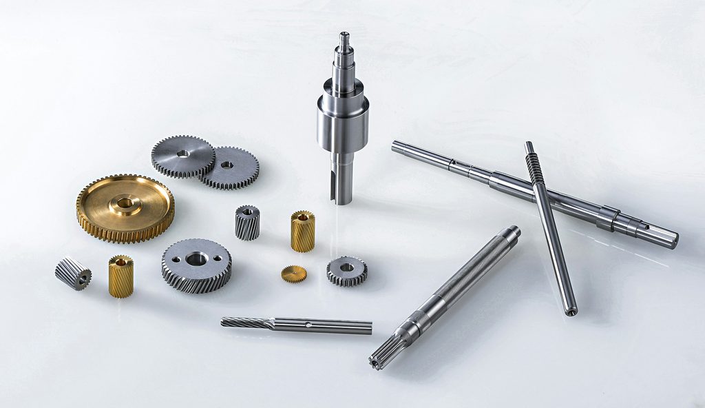 Small precision parts turned on a CNC lathe